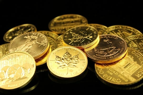 a collection of different types of gold coins